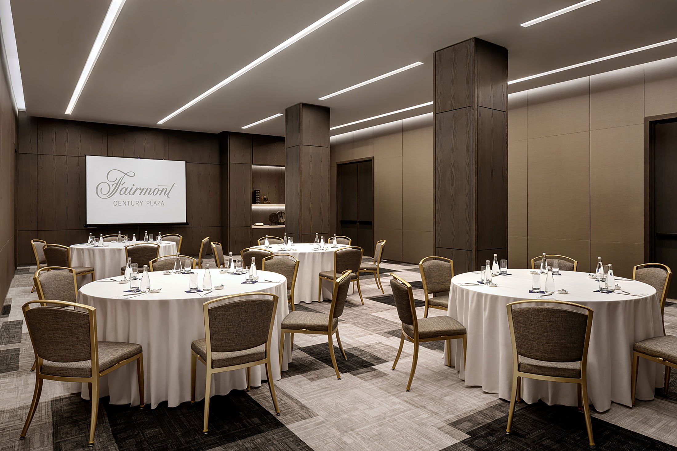 Meeting room with round tables and chairs